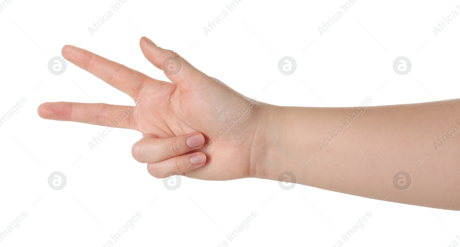 Photo of Playing rock, paper and scissors. Woman making scissors with her fingers on white background, closeup