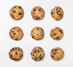 Flat lay composition with chocolate cookies on white background