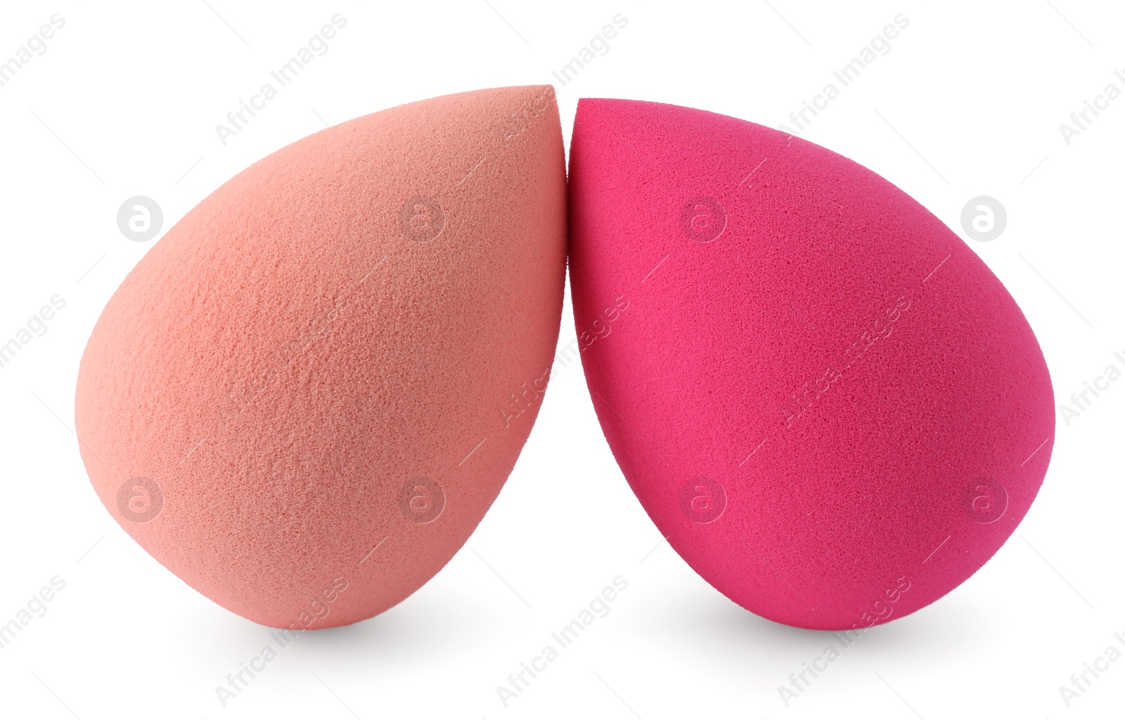Photo of Two different make up sponges isolated on white