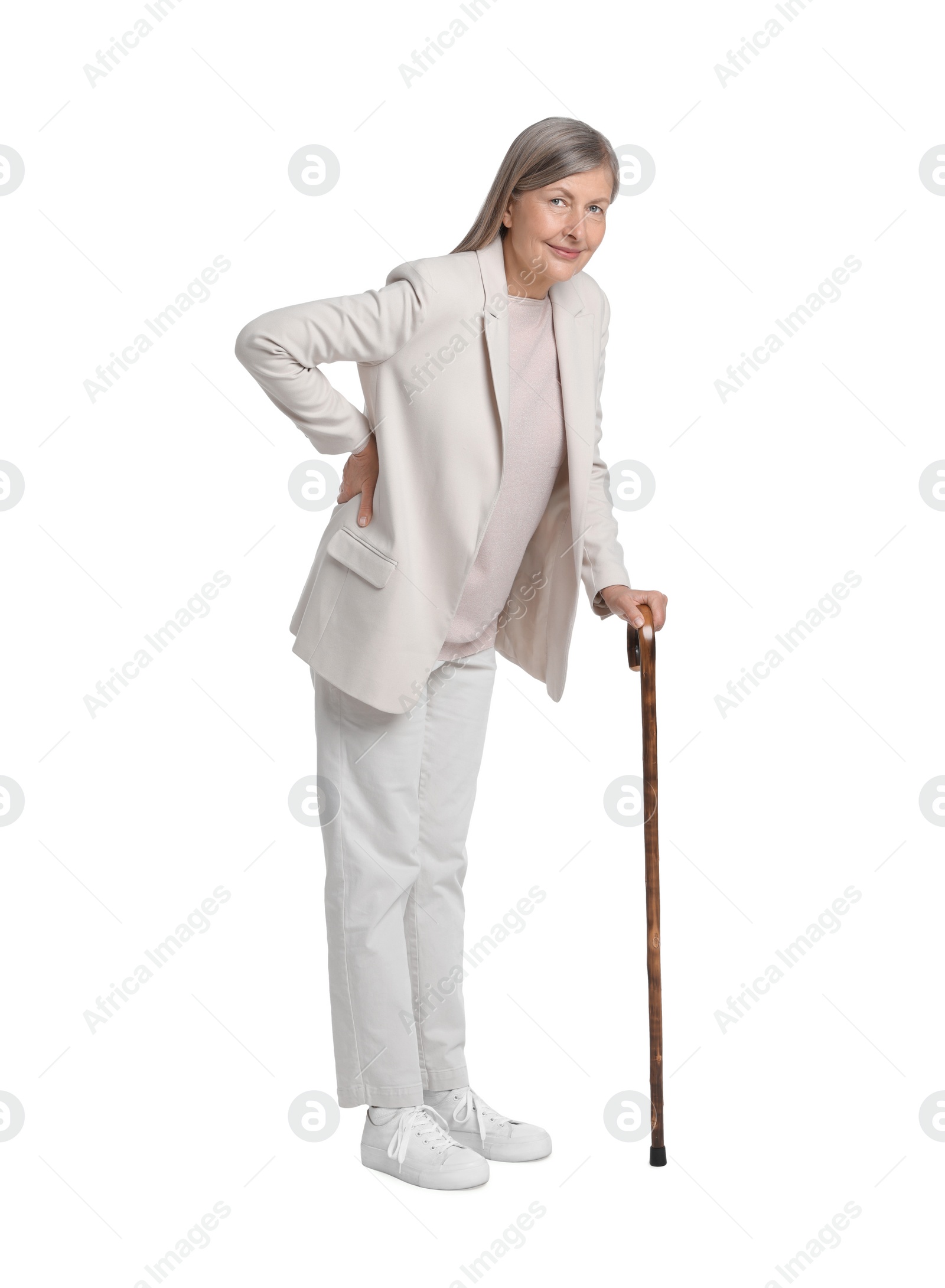 Photo of Senior woman with walking cane on white background