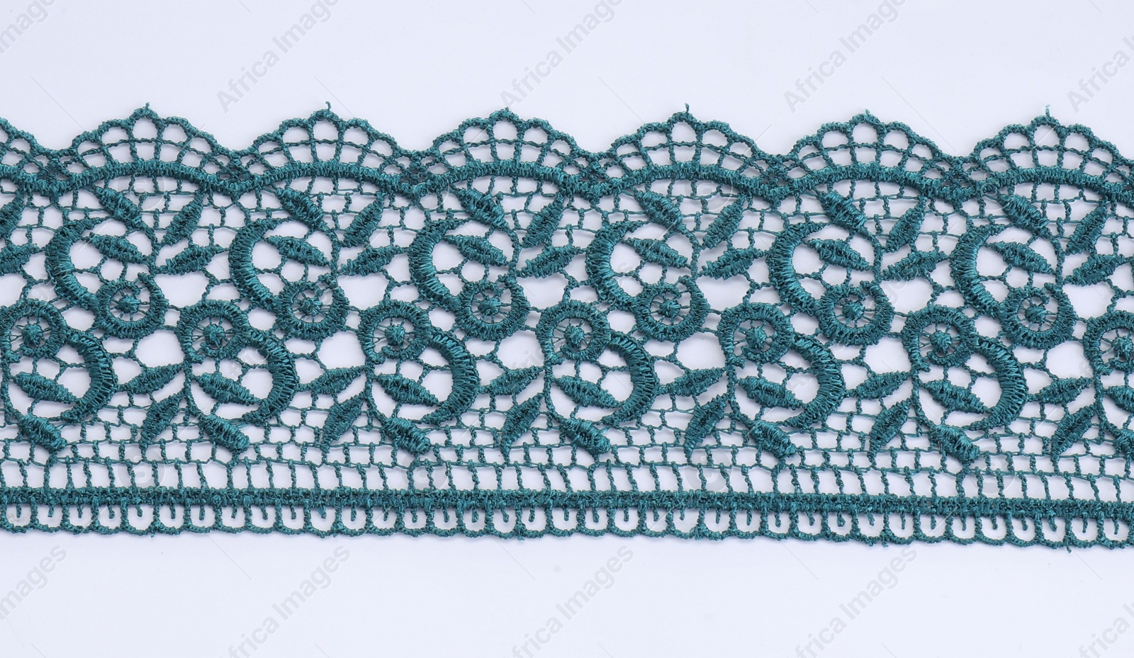 Photo of Beautiful lace on white background, top view