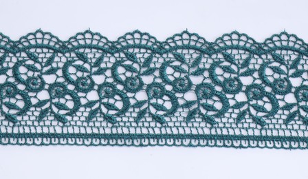 Photo of Beautiful lace on white background, top view