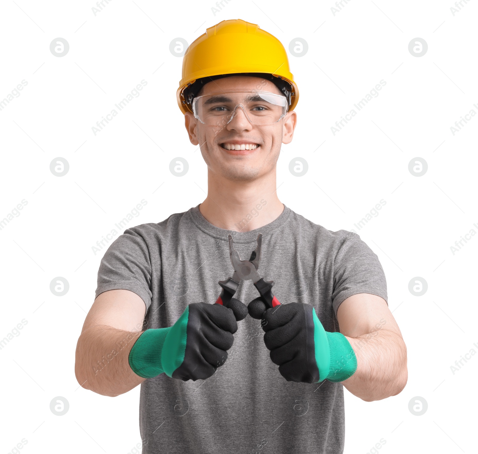 Photo of Young man holding pliers on white background