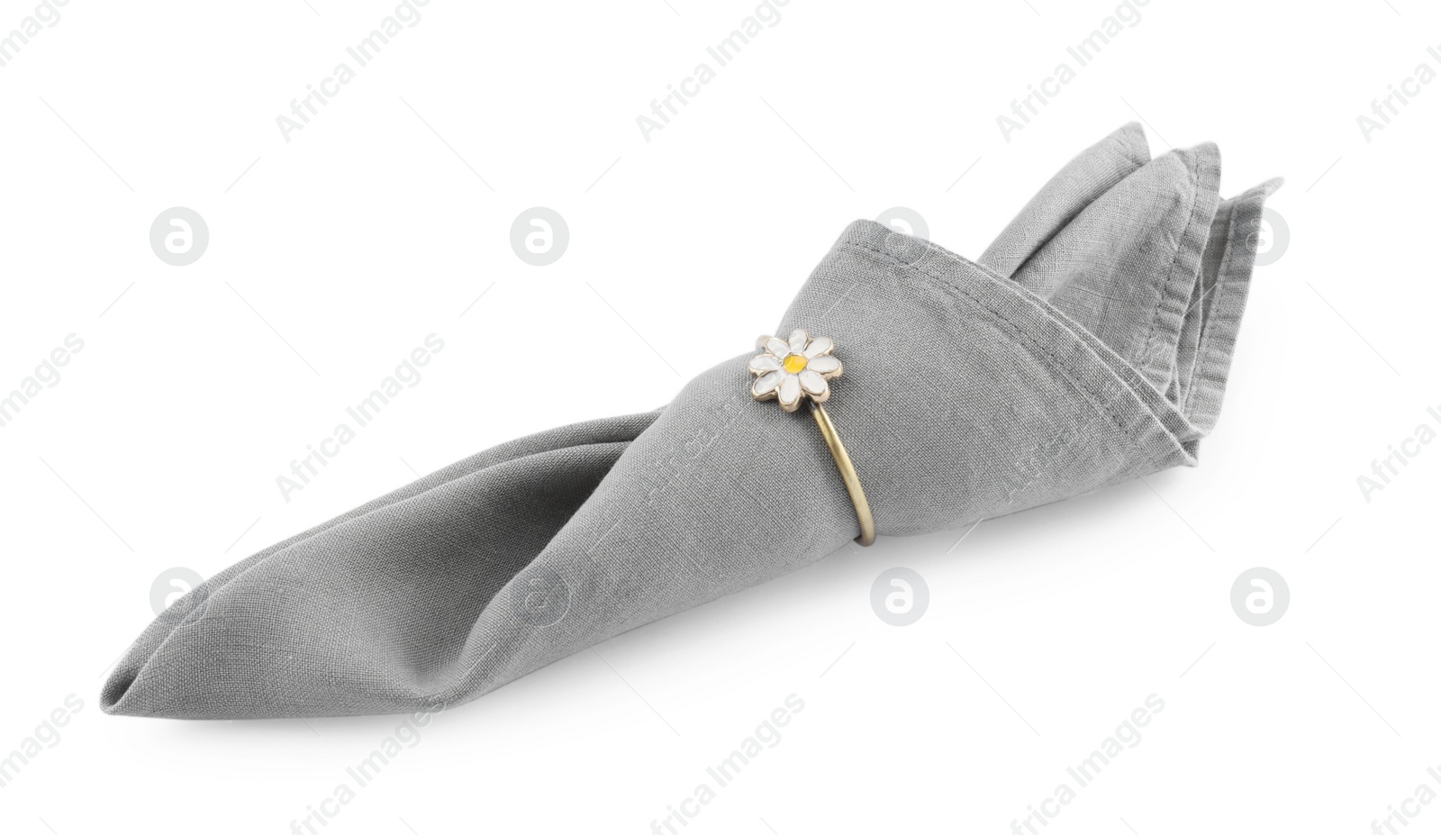 Photo of Napkin with decorative ring for table setting isolated on white