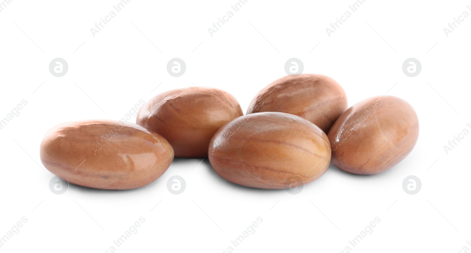 Photo of Many raw jackfruit seeds on white background