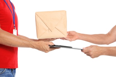 Courier giving parcel and clipboard to client on white background, closeup