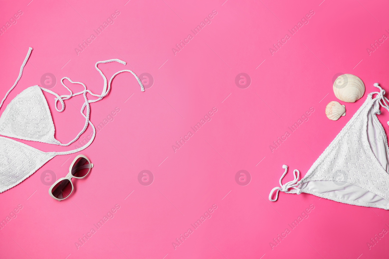 Photo of Flat lay composition with stylish bikini on color background. Space for text