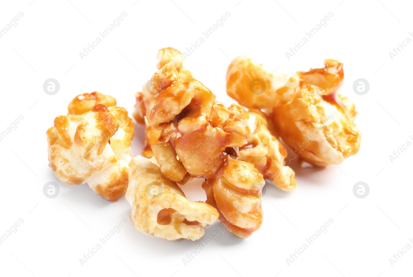 Photo of Pile of delicious caramel popcorn on white background