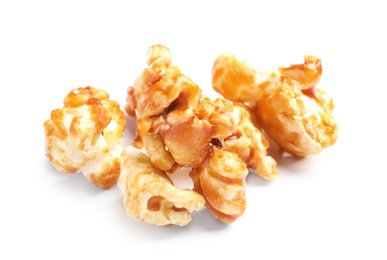 Pile of delicious caramel popcorn on white background