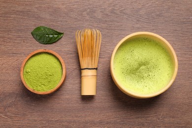 Flat lay composition with matcha tea on wooden table