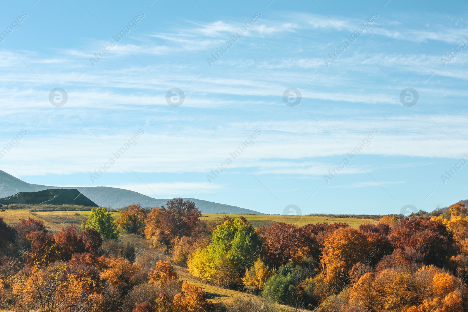 Photo of Beautiful landscape with blue sky over mountain slopes