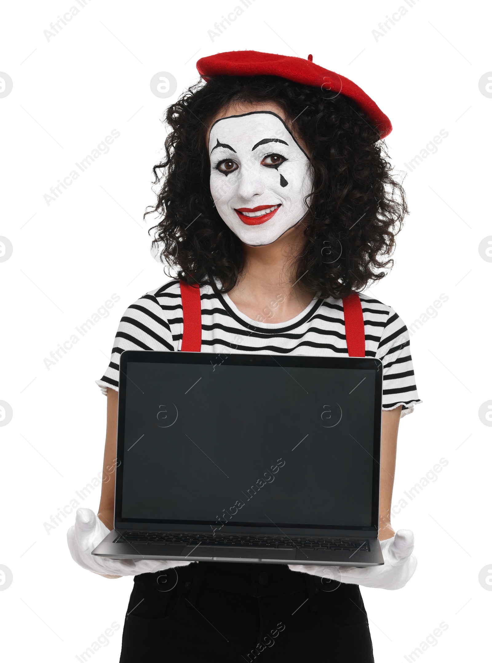 Photo of Funny mime with laptop posing on white background