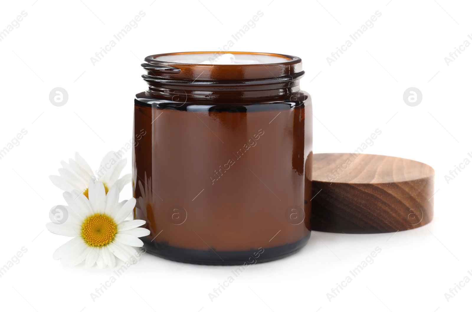 Photo of Jar of hand cream and chamomiles on white background