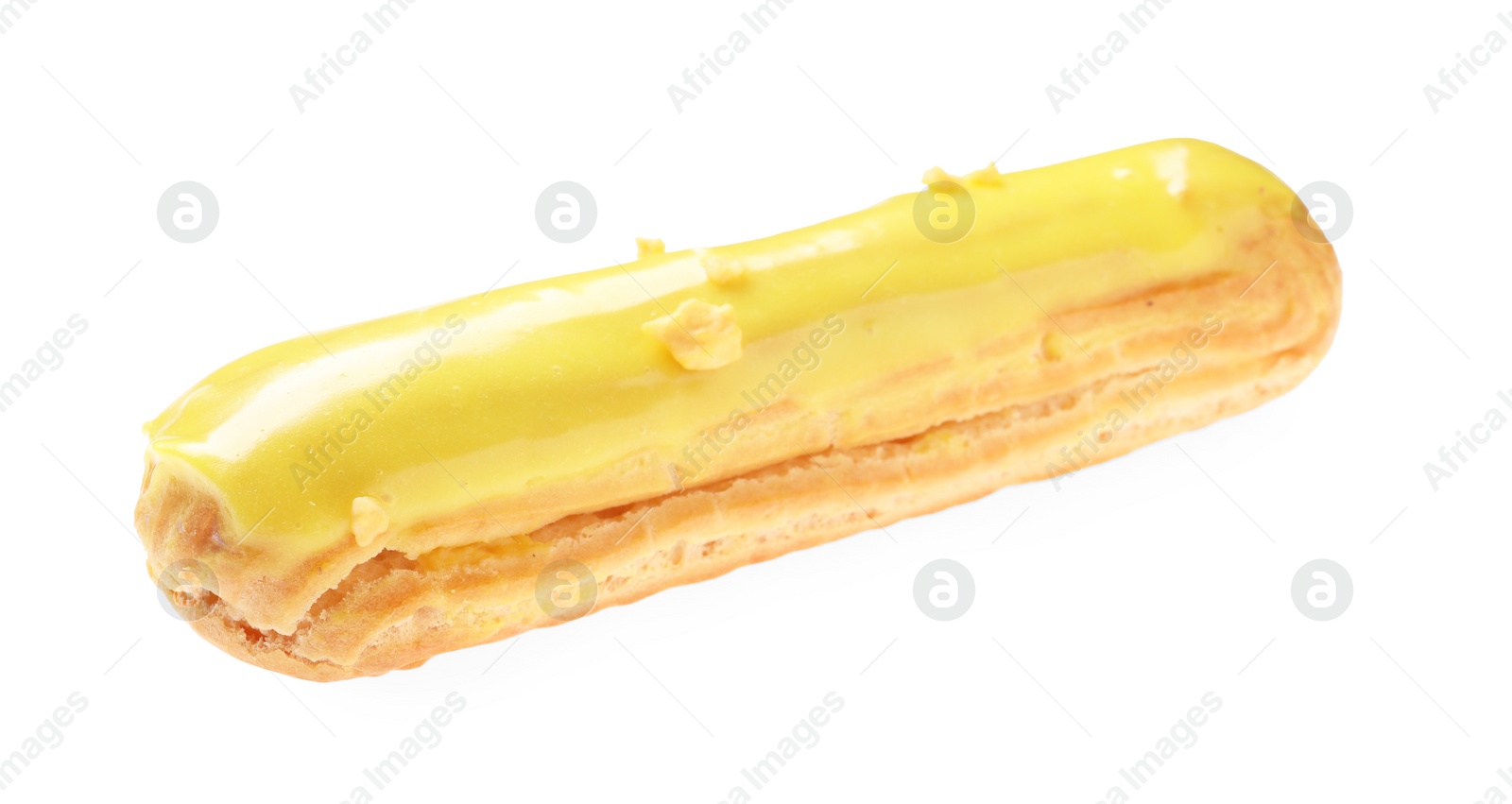 Photo of Delicious eclair covered with yellow glaze isolated on white