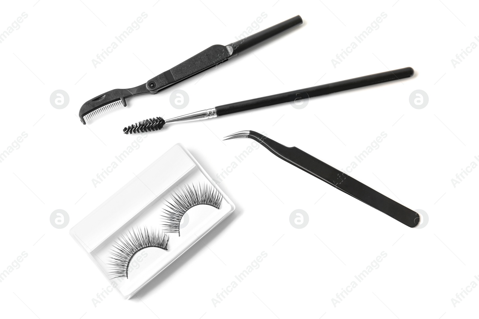 Photo of Composition with false eyelashes and tweezers on white background