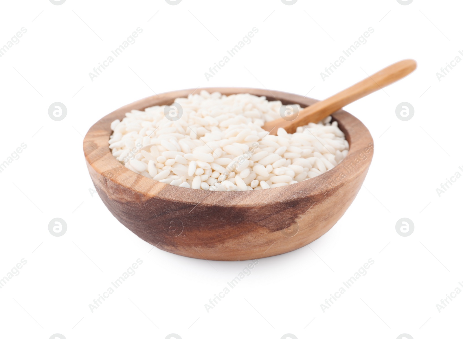 Photo of Raw rice in wooden bowl isolated on white