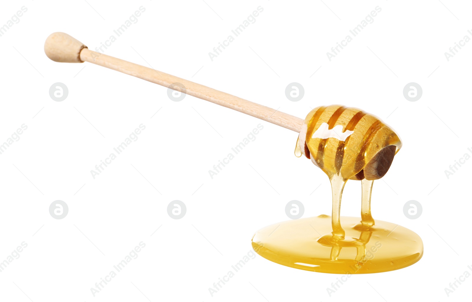 Photo of Natural honey dripping from dipper on white background