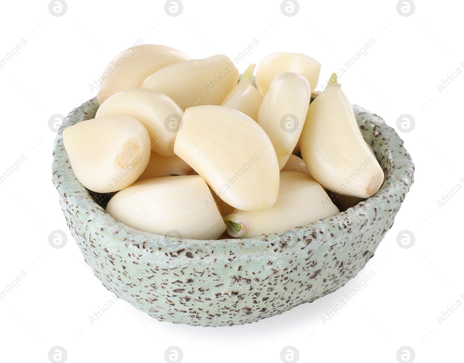 Photo of Peeled cloves of fresh garlic in bowl isolated on white