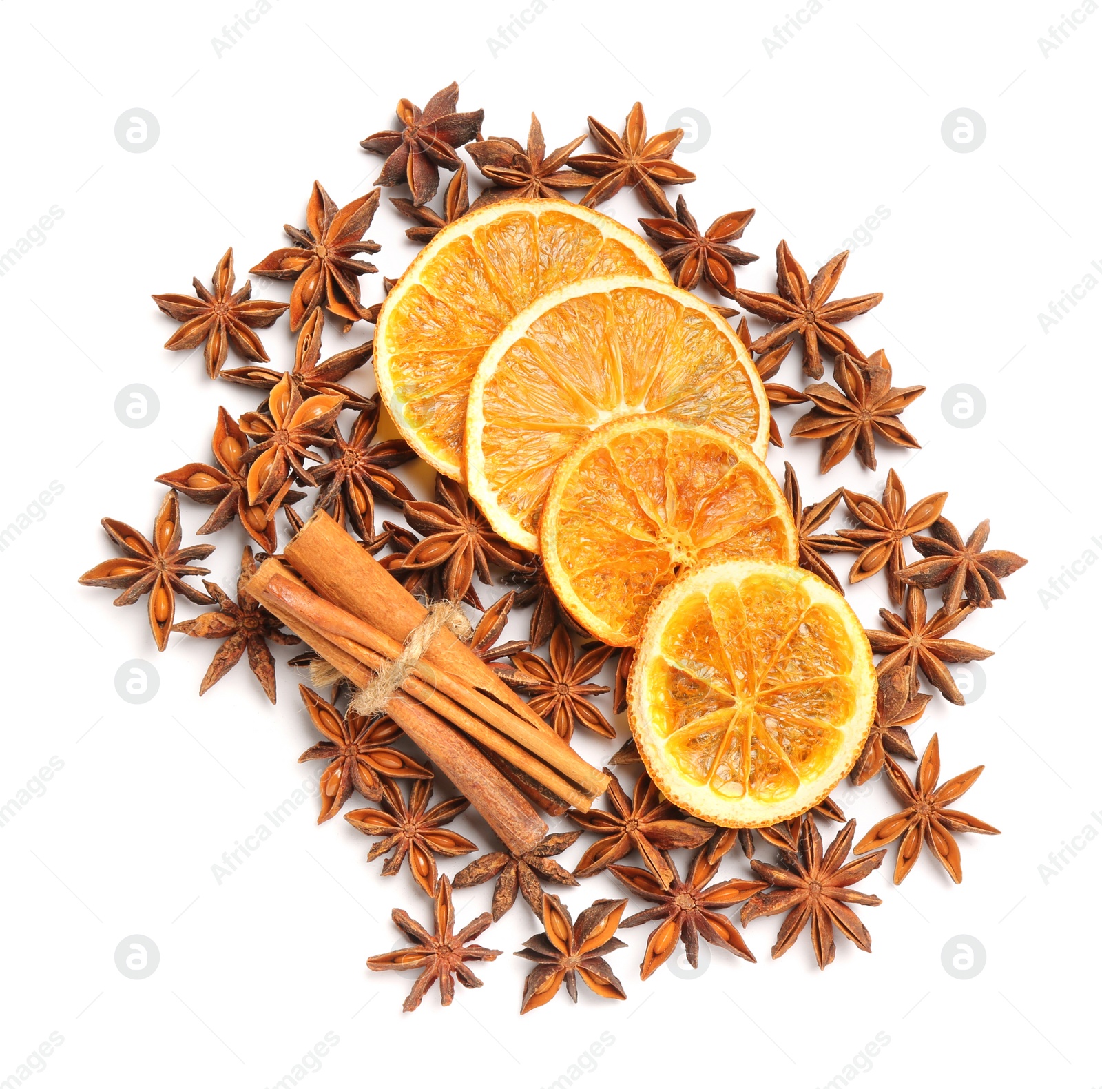 Photo of Dry orange slices, cinnamon sticks and anise stars isolated on white, top view