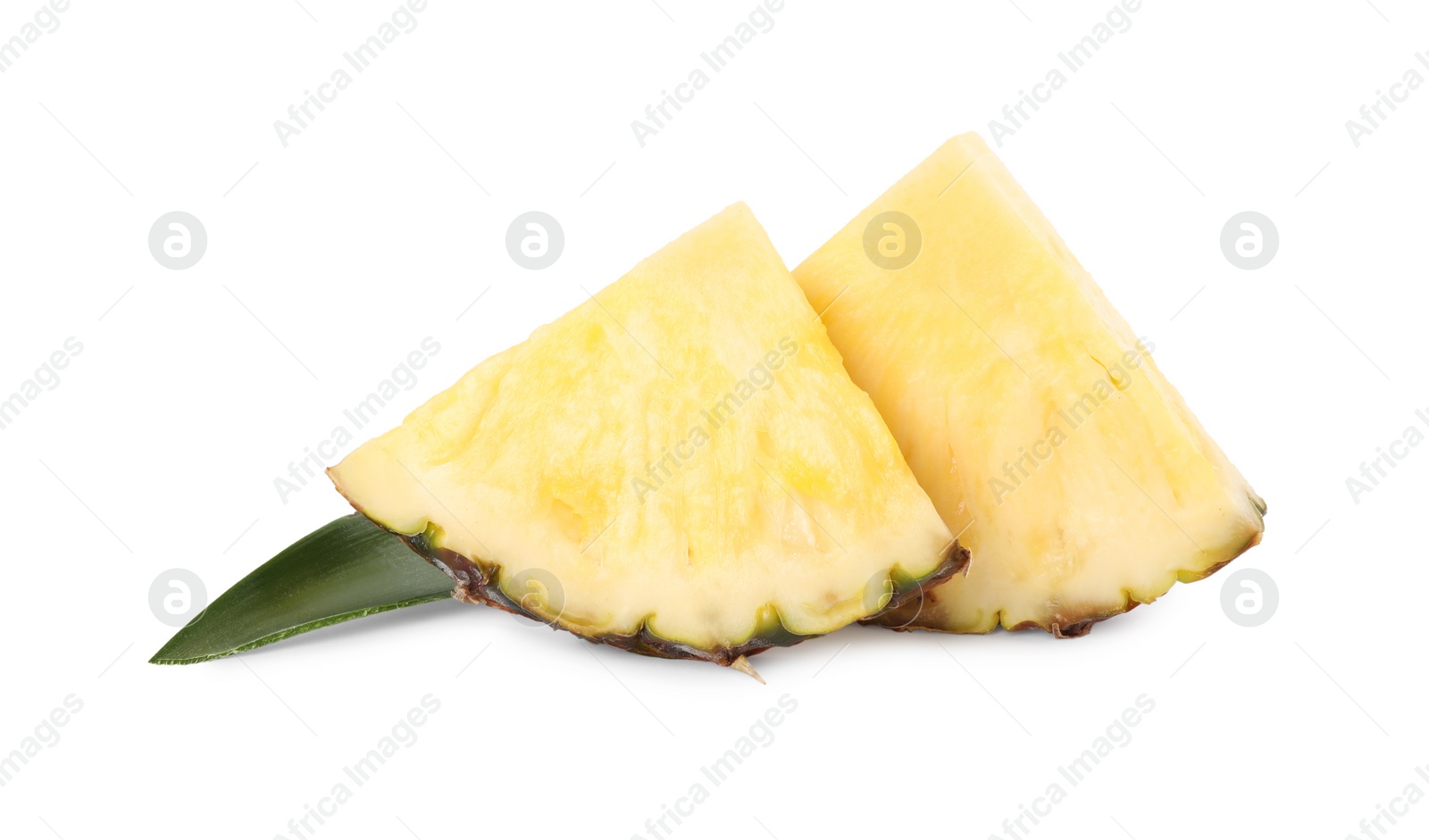 Photo of Slices of tasty ripe pineapple and green leaf isolated on white
