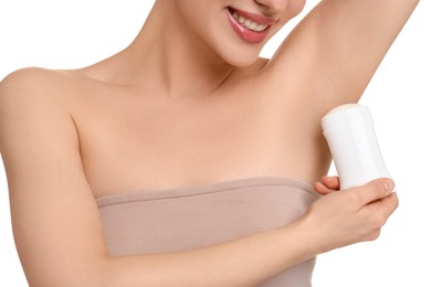 Photo of Woman applying deodorant on white background, closeup