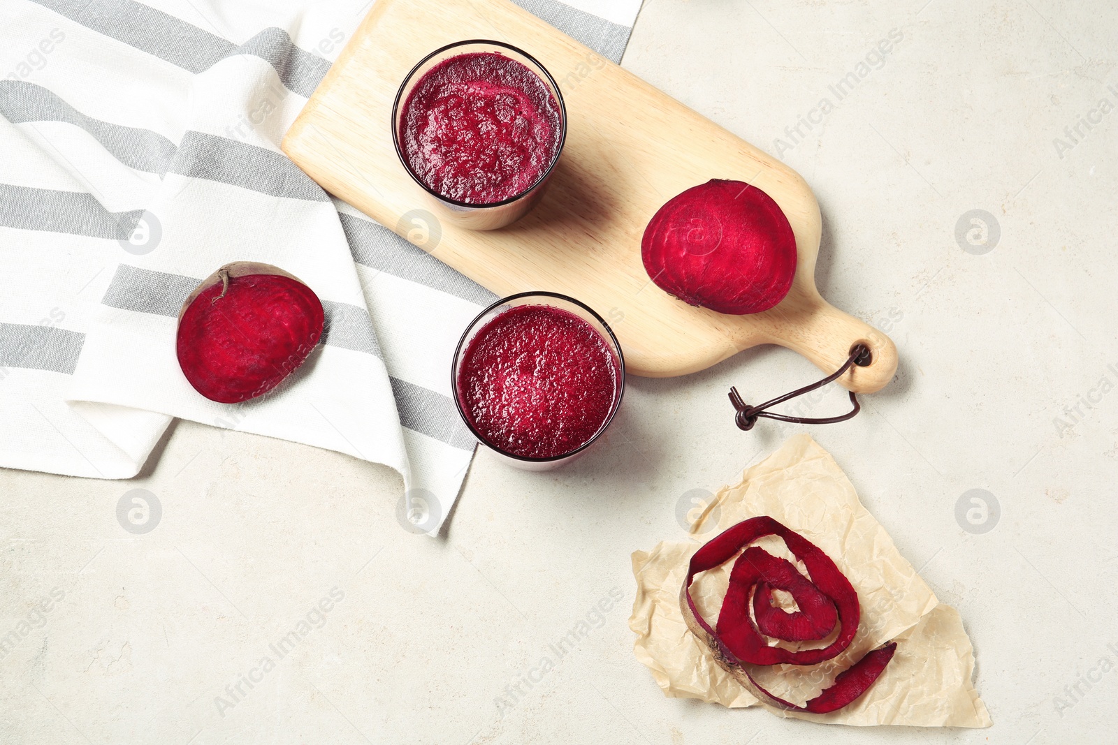 Photo of Flat lay composition with beet smoothies on light background