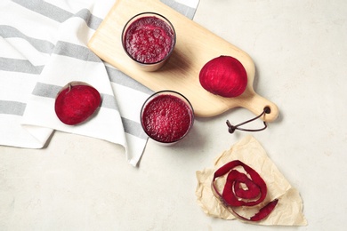 Flat lay composition with beet smoothies on light background