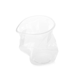Photo of Crumpled disposable plastic cup isolated on white