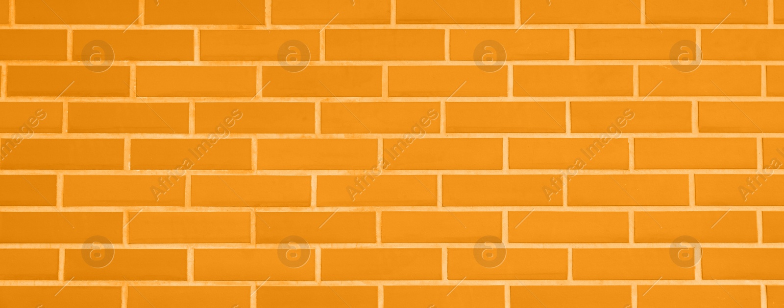 Image of Texture of bright orange brick wall as background, banner design