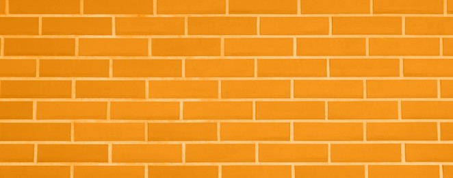 Image of Texture of bright orange brick wall as background, banner design