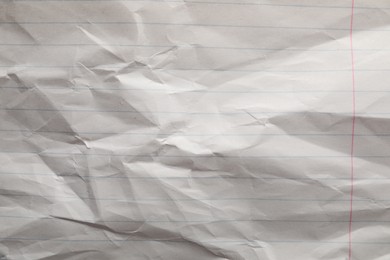 Photo of Crumpled sheet of paper as background, top view