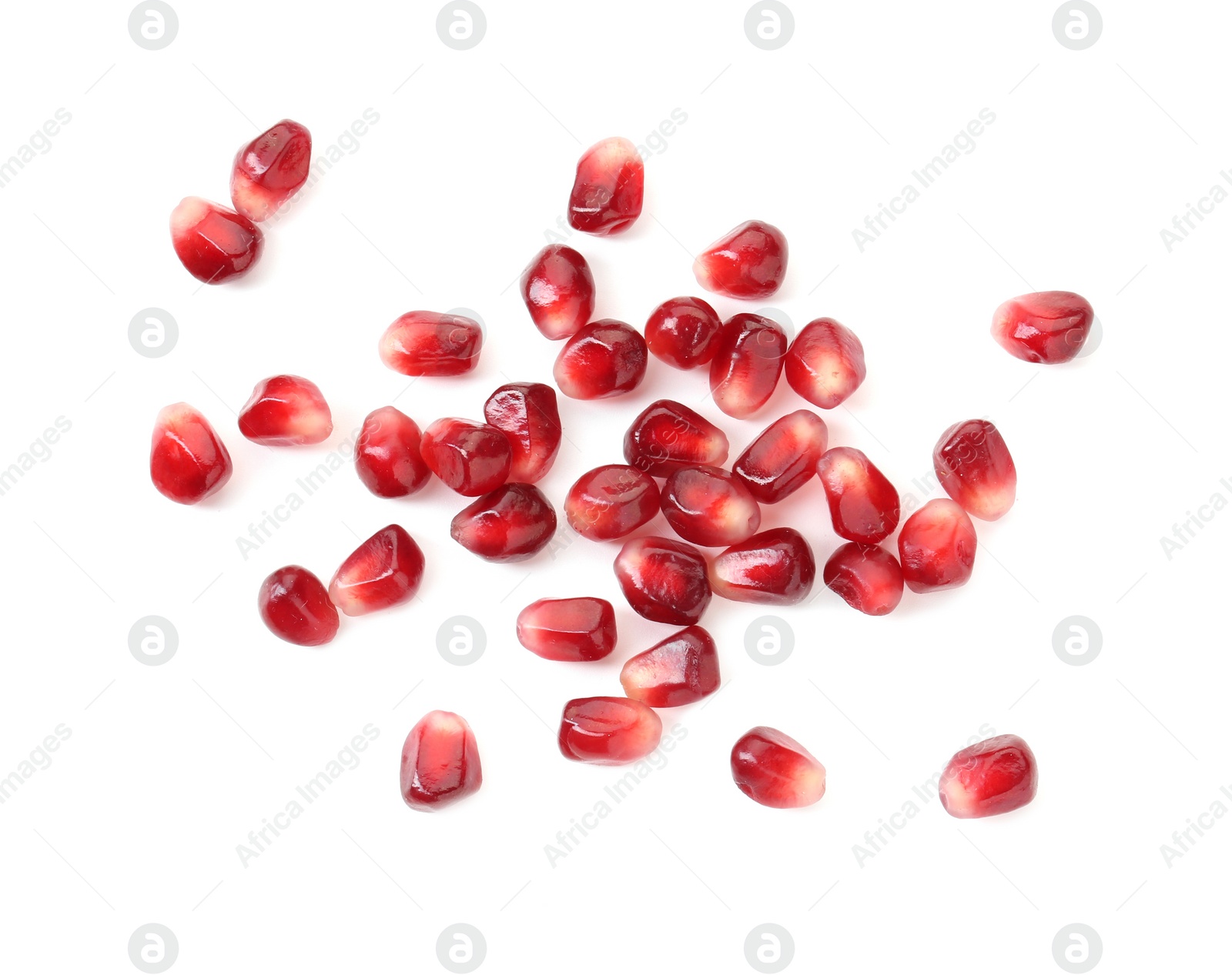 Photo of Ripe juicy pomegranate grains isolated on white, top view