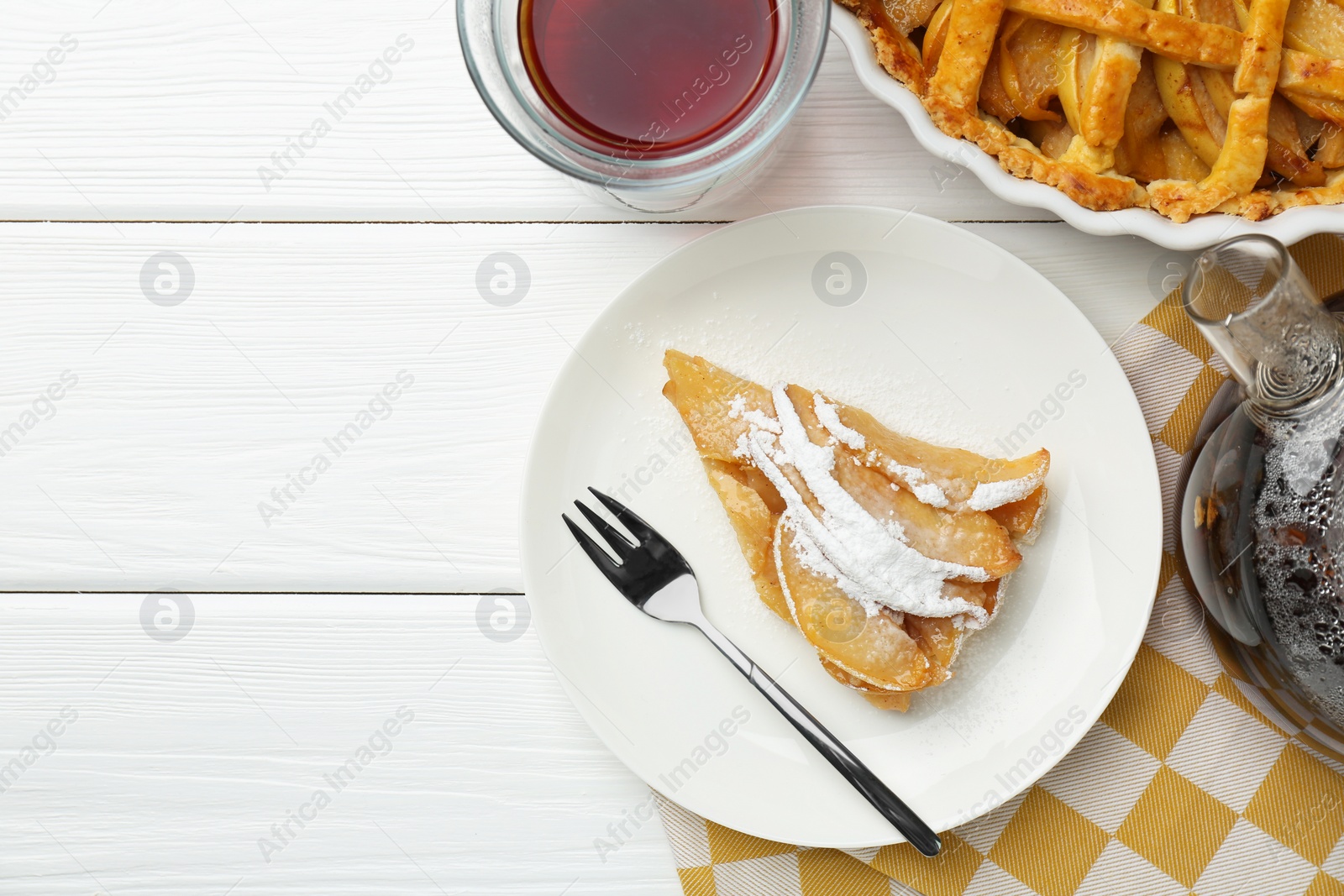Photo of Piece of tasty homemade quince pie with powdered sugar served on white wooden table, flat lay. Space for text