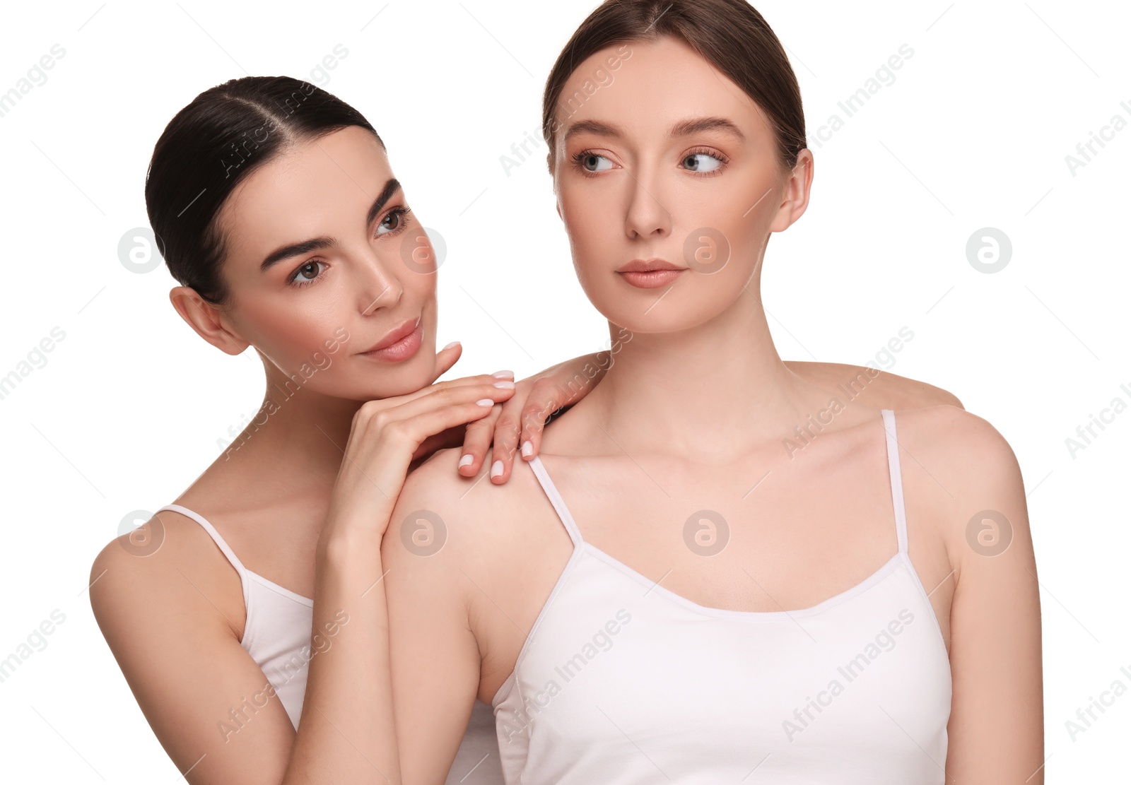 Photo of Beautiful young women with healthy skin on white background