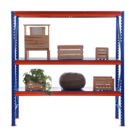 Photo of Bright metal shelving unit with wooden crates and houseplant on white background