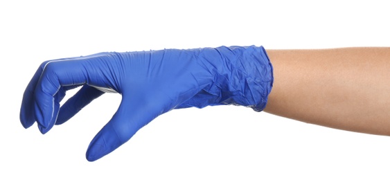 Photo of Woman in blue latex gloves holding something on white background, closeup of hand