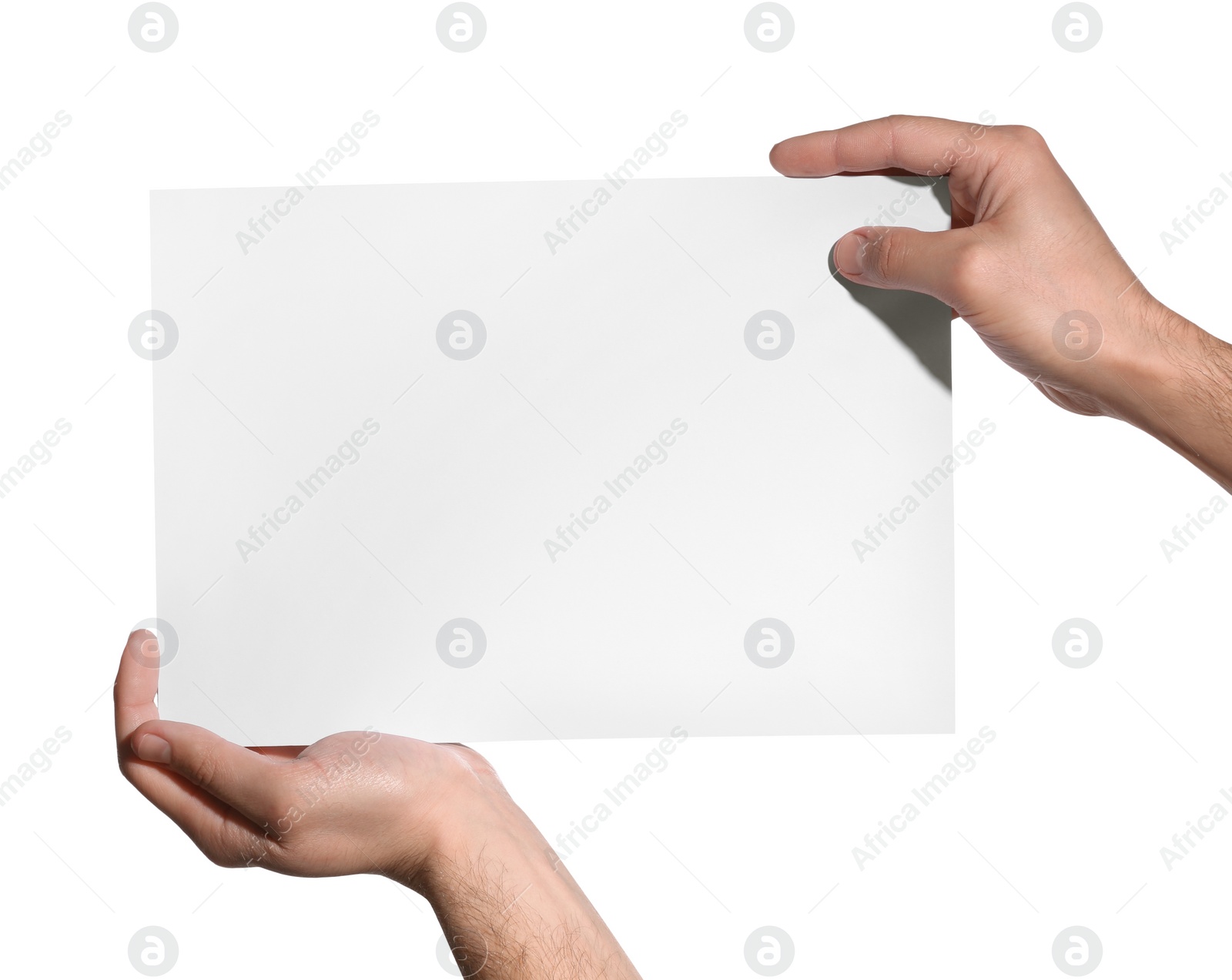 Photo of Man holding sheet of paper on white background, closeup. Mockup for design