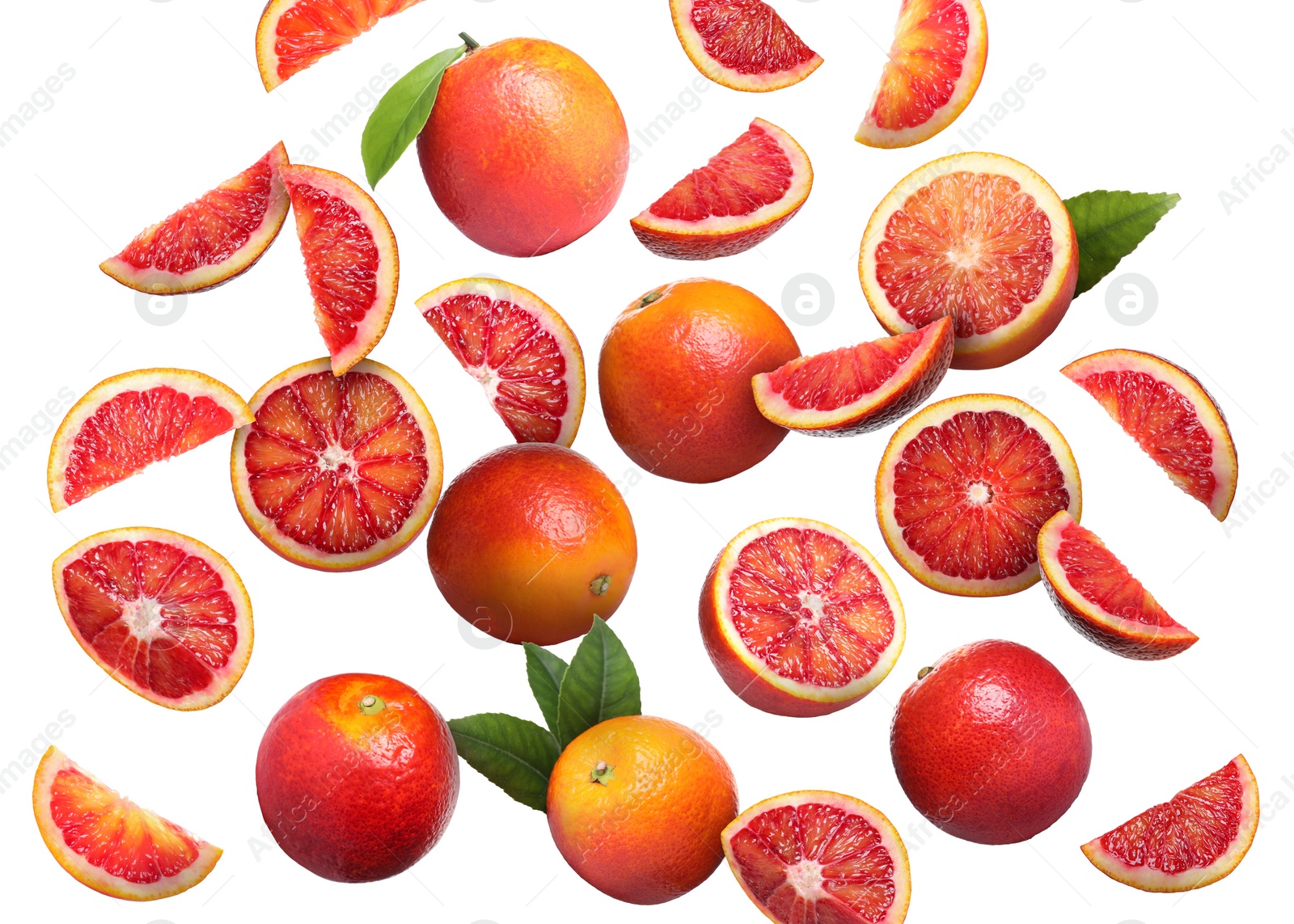 Image of Many tasty Sicilian oranges and green leaves falling on white background