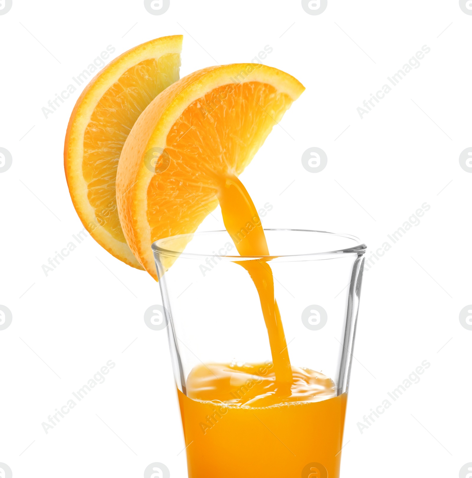 Image of Making orange fresh. Juice pouring from orange citrus slices into glass on white background