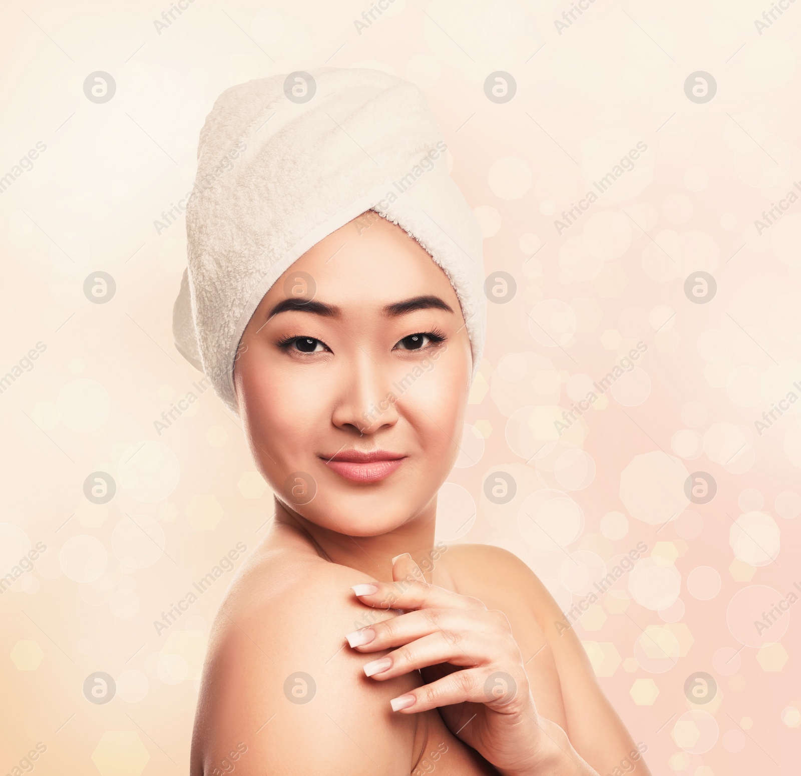 Image of Beautiful young Asian woman with silky skin on light background. Spa treatment 