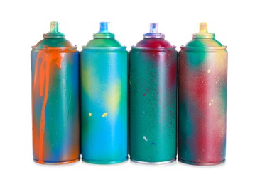 Photo of Many spray paint cans isolated on white