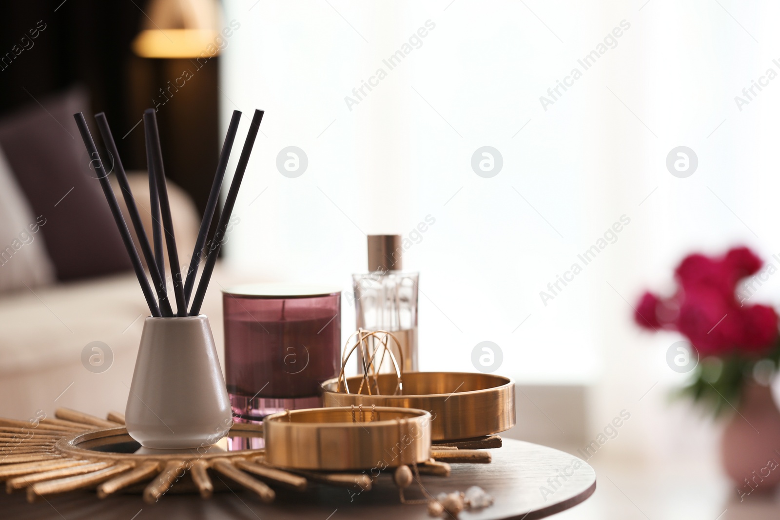 Photo of Composition with stylish accessories and interior elements on table indoors