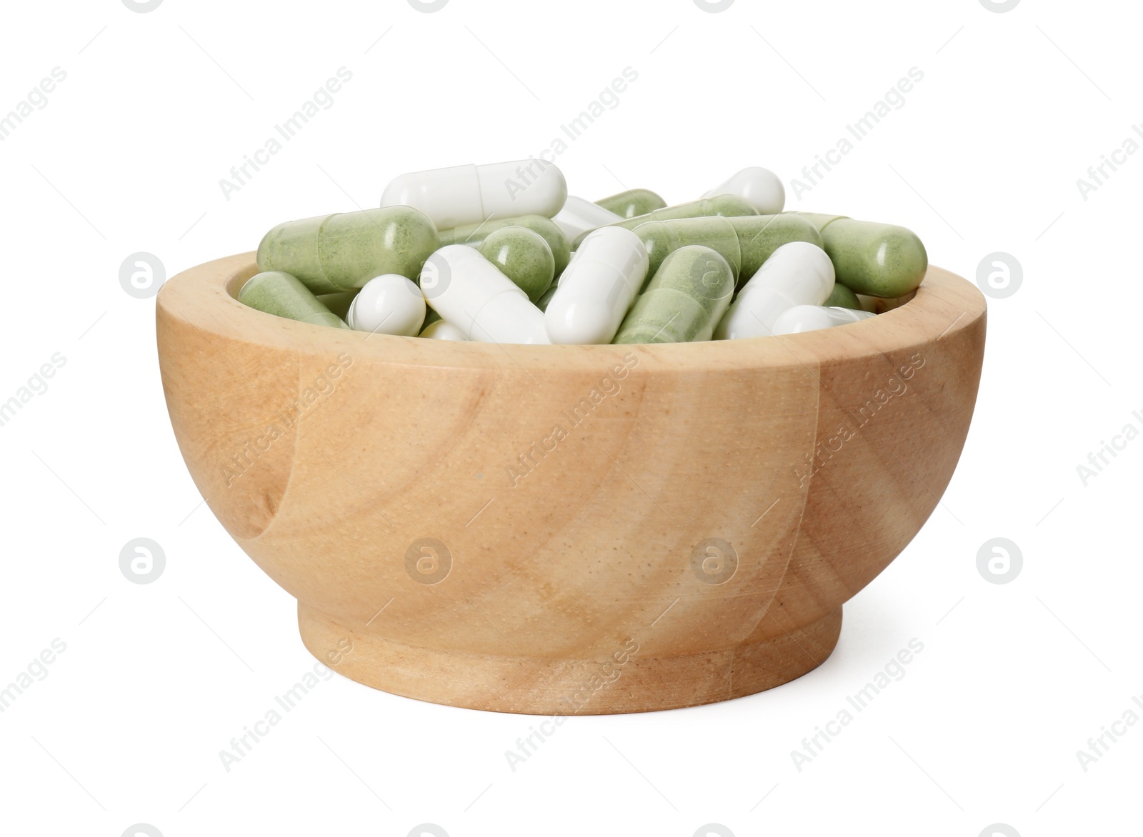 Photo of Vitamin capsules in bowl isolated on white. Health supplement