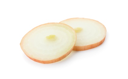 Photo of Slices of raw yellow onion on white background
