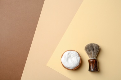 Photo of Flat lay composition with men's shaving accessories and space for text on color background