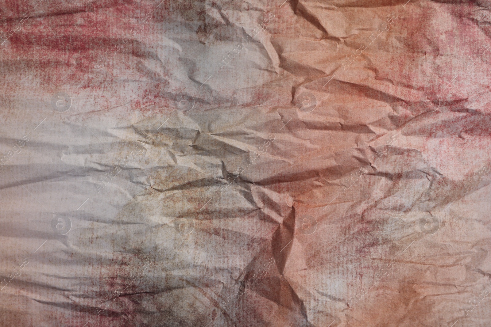 Photo of Texture of crumpled parchment paper as background, top view