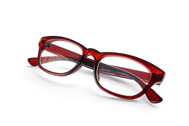 Photo of Glasses with corrective lenses on white background. Vision problem