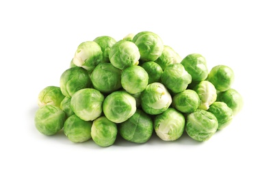 Photo of Pile of fresh Brussels sprouts on white background