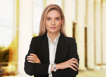 Image of Lawyer, consultant, business owner. Confident woman outdoors