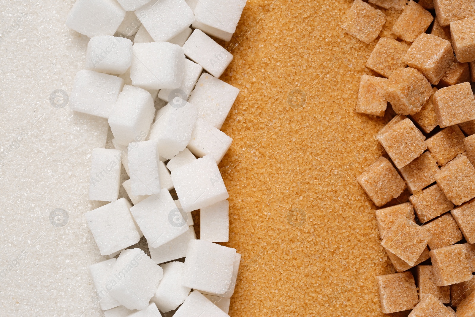 Photo of Different types of sugar as background, top view